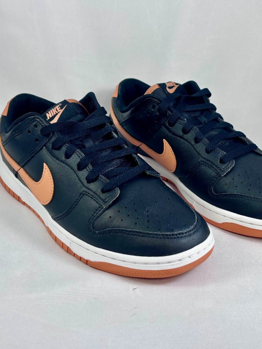 Nike Dunk Low in the Black/Amber Brown colorway (style DV0831-004)